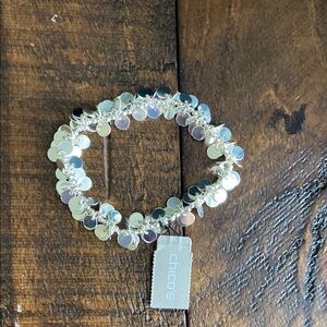 NWT. Chico's Silver Iridescent Disc Bracelet